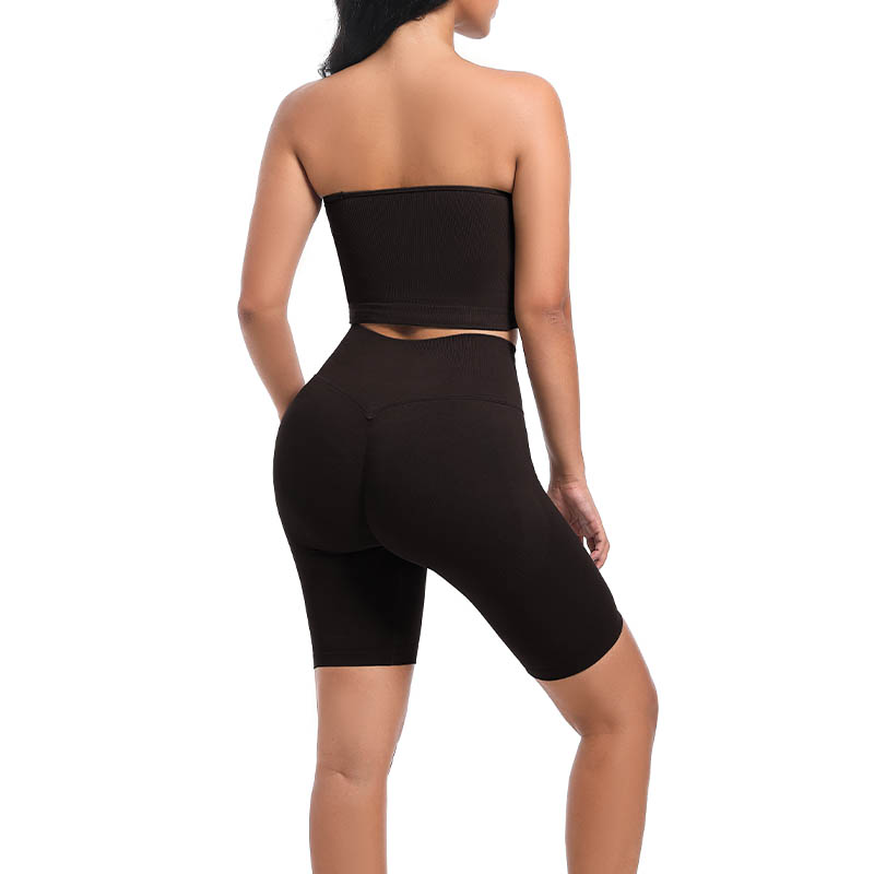 Back view of model's legs wearing black seamless high waist shorts