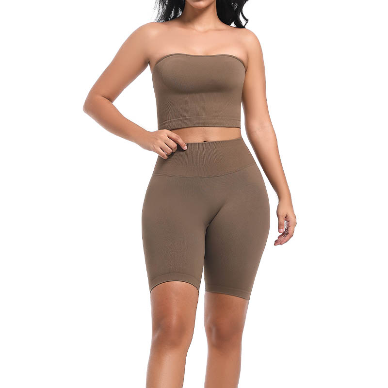 Front view of model's legs wearing brown seamless high waist shorts